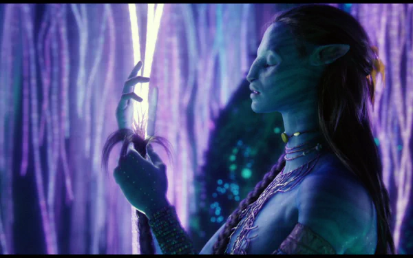 HD PC desktop wallpaper featuring a scene from the movie Avatar, showcasing a glowing, blue-skinned Na'vi character surrounded by bioluminescent flora.