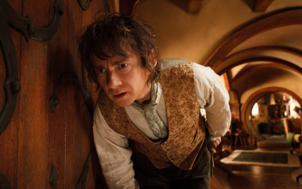 HD wallpaper of a hobbit peeking through a wooden door, capturing the whimsical essence of The Lord of the Rings.