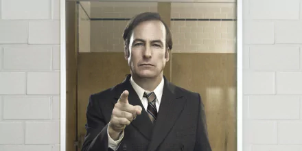 HD desktop wallpaper of Bob Odenkirk as Jimmy McGill from Better Call Saul, pointing towards the viewer.