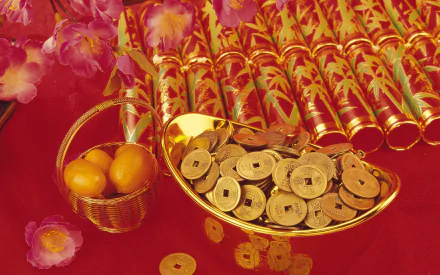 HD PC wallpaper: Chinese New Year holiday scene with gold ingot and round coins, red firecrackers, a basket of golden oranges and pink blossoms on a rich red background.