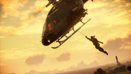 Rico Rodriguez from Just Cause 3 leaps from a helicopter against a stunning sunset backdrop, capturing the thrill of this action-packed video game in an HD wallpaper.