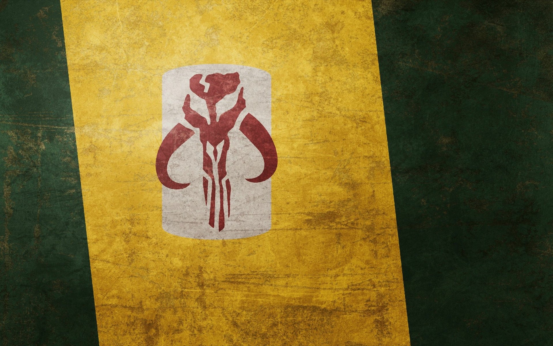 HD PC desktop wallpaper featuring the iconic Mandalorian skull emblem from the Star Wars movie universe on a textured yellow and green background.