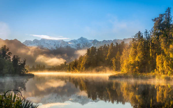  The Golden Sunrise at Lake Matheson by Jacob Surland