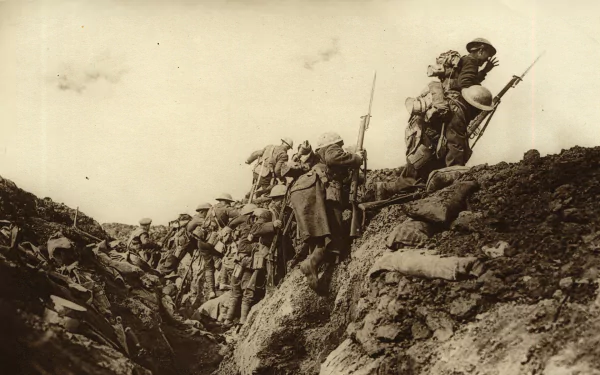 A historic World War I scene depicting soldiers navigating trenches, capturing the intensity and camaraderie of military life during the conflict. HD desktop wallpaper background.