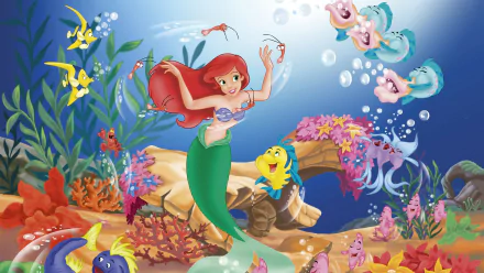 HD PC desktop wallpaper featuring Disney's Ariel from the video game Ariel: The Little Mermaid, surrounded by colorful underwater sea life and coral.