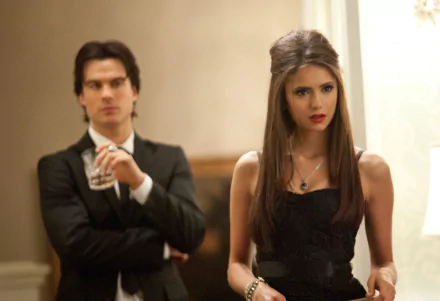 HD PC desktop wallpaper featuring characters from the TV show The Vampire Diaries in formal attire, showcasing a dramatic and intense scene.