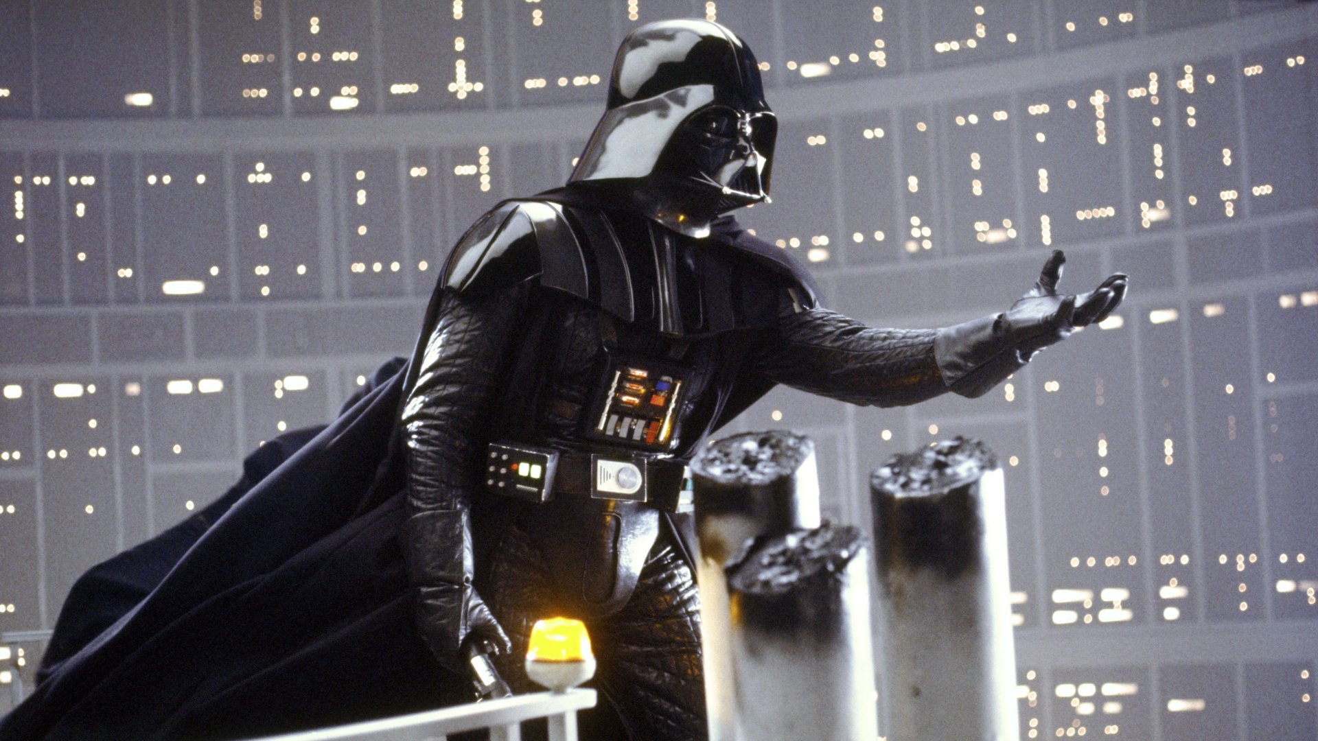 Darth Vader stands with an outstretched hand in a scene from Star Wars Episode V: The Empire Strikes Back, captured in an HD PC desktop wallpaper.