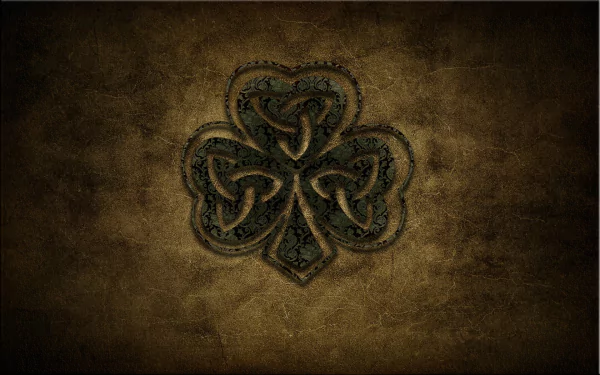 HD PC desktop wallpaper featuring a man-made Irish Celtic design with an intricate three-lobed knot set against a textured brown background.