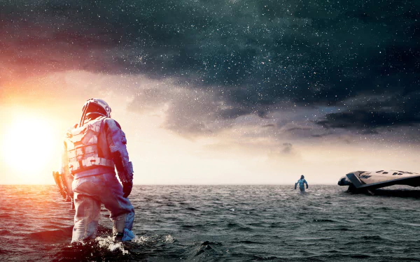HD wallpaper from the movie Interstellar showing astronauts wading through an alien ocean under a dramatic sky, with a spacecraft in the background.