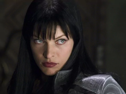 HD PC desktop wallpaper featuring a close-up of the main character from the movie Ultraviolet, showcasing intense expression and dark, futuristic attire.