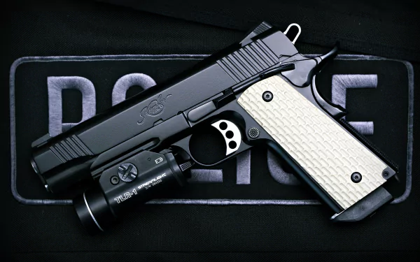 4K Ultra HD desktop wallpaper of a Kimber Warrior pistol with tactical light resting on a black POLICE patch — police, military, man-made.