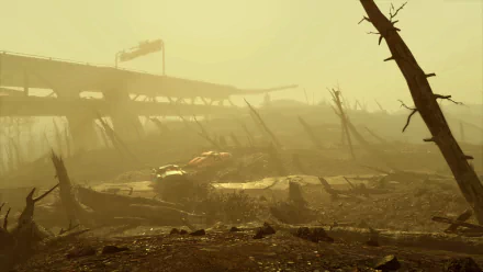 A desolate landscape from Fallout 4, featuring barren trees and a dilapidated highway in a hazy, yellow atmosphere, creating a striking HD desktop wallpaper.