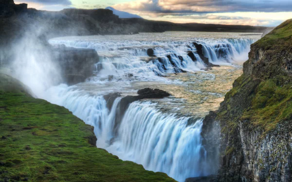 A stunning 4K view of Gullfoss waterfall on the Hvítá River, flowing through the canyon near Langjökull glacier in Arctic Iceland's natural landscape.
