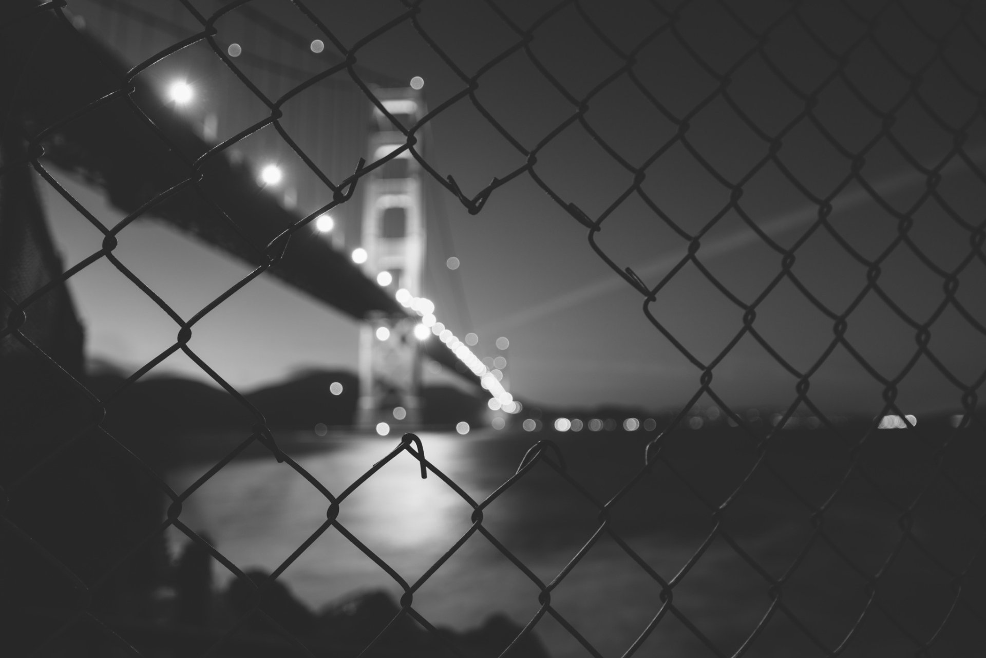 Download Bridge Black & White USA California Fence Night Man Made Golden Gate Bridge HD Wallpaper by Arthur Chang