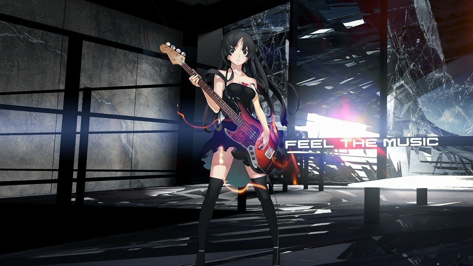 HD PC desktop wallpaper featuring Mio Akiyama from the anime K-ON! playing bass guitar in a dark, industrial setting with the text FEEL THE MUSIC.