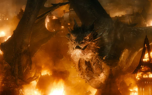 HD desktop wallpaper from The Hobbit: The Battle of the Five Armies featuring a dragon attacking a fiery village.