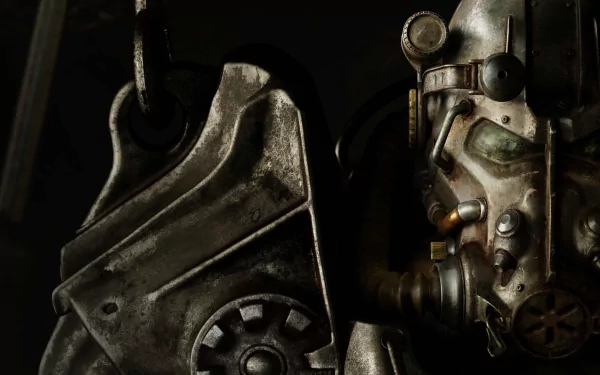 A close-up of Power Armor from the video game Fallout 4, showcasing its intricate design and metallic texture, serves as a striking HD wallpaper.