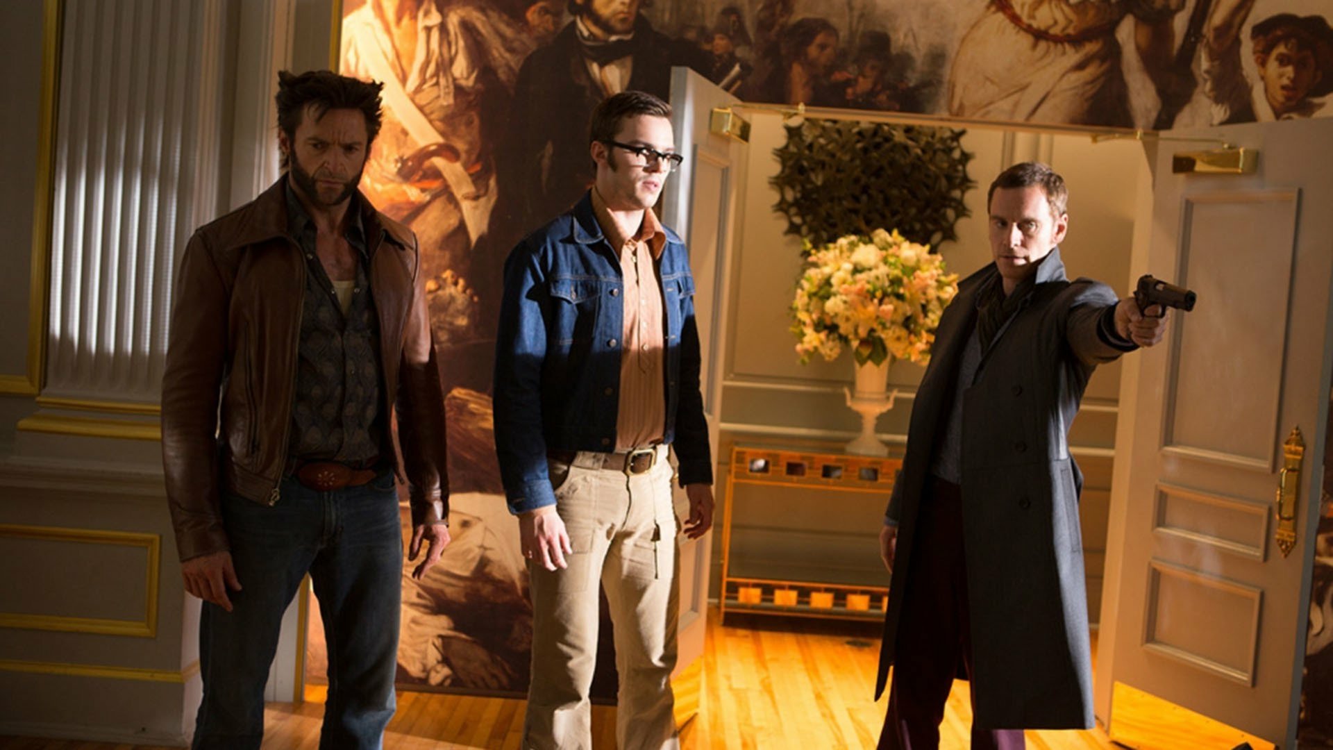 HD PC desktop wallpaper from the movie X‑Men: Days of Future Past — three characters in a sunlit ornate room: a leather‑clad man with claws, a bespectacled man in denim, and a coat‑clad man aiming a gun.