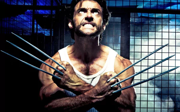 HD desktop wallpaper featuring Logan James Howlett from X-Men Origins: Wolverine in a fierce pose with his iconic claws extended. The intense backdrop reflects the movie's dramatic atmosphere.