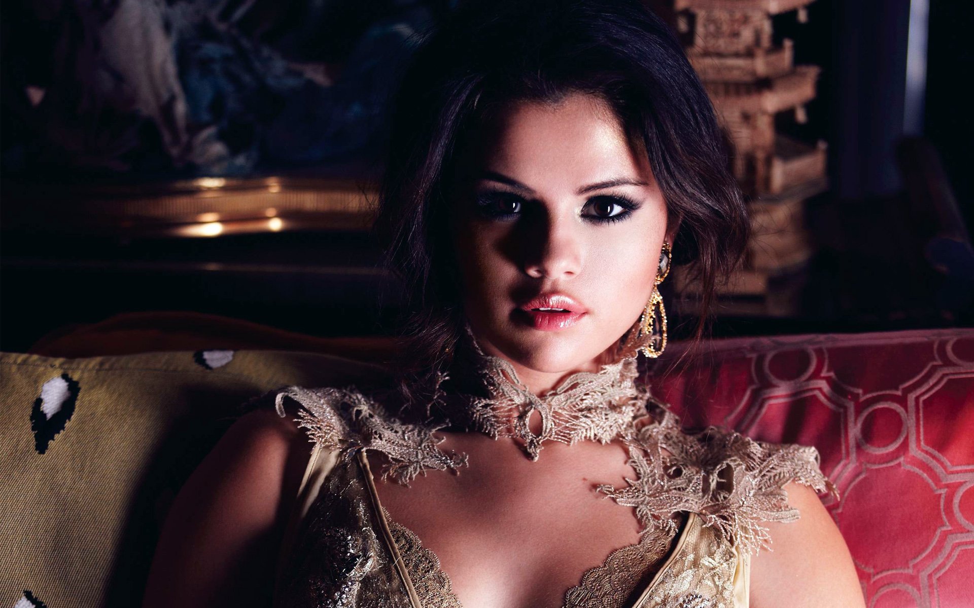 HD wallpaper featuring Selena Gomez, showcasing a striking portrait with an elegant background, capturing her beauty and presence in the music world.