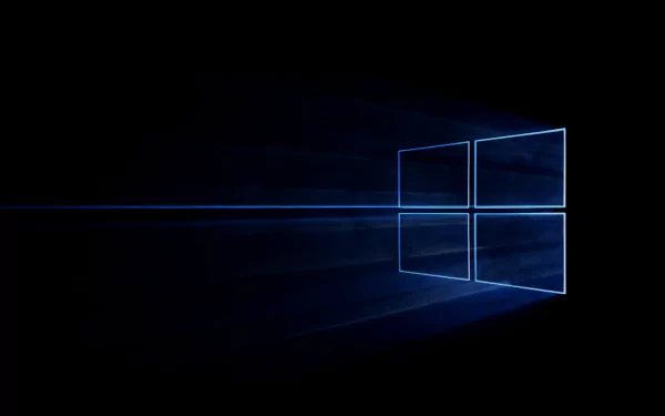HD desktop wallpaper featuring the Windows 10 logo, with a minimalist design set against a black background. A sleek representation of Microsoft’s technology.