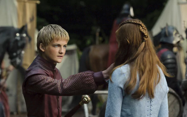 HD desktop wallpaper featuring Sophie Turner as Sansa Stark and Jack Gleeson as Joffrey Baratheon from the TV show Game of Thrones.