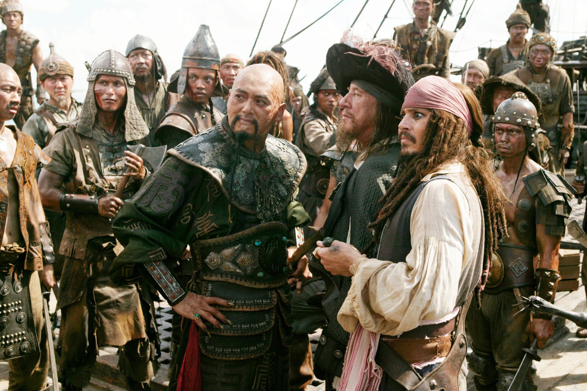 HD desktop wallpaper featuring Chow Yun-Fat as Captain Sao Feng and Johnny Depp as Jack Sparrow alongside Hector Barbossa from Pirates of the Caribbean: At World's End.