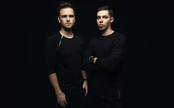 Portrait of two DJs (tagged Tom & Jame) in black outfits against a dark background, 5K Ultra HD PC desktop wallpaper.