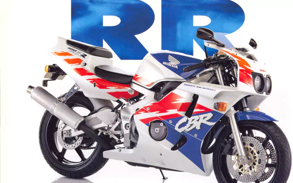 A vibrant HD desktop wallpaper featuring a Honda CBR motorcycle, showcasing its distinctive design and colors against a bold blue background.