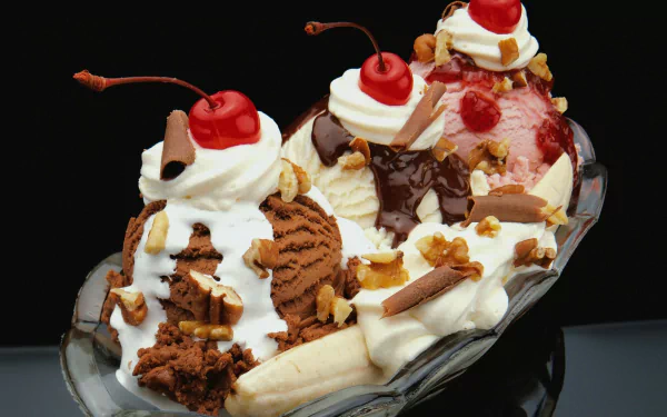 HD desktop wallpaper featuring a classic banana split with scoops of chocolate, vanilla, and strawberry ice cream, topped with whipped cream, cherries, nuts, and chocolate pieces.
