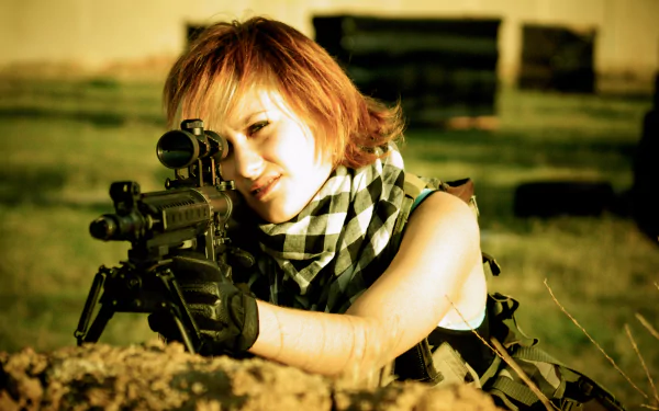 5K Ultra HD PC desktop wallpaper/background: woman in tactical gear and scarf aiming a rifle from a low position, Girls & Guns theme.
