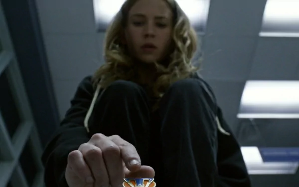 Brittany Robertson from the movie Tomorrowland in a dramatic close-up, featured in an HD PC desktop wallpaper and background.