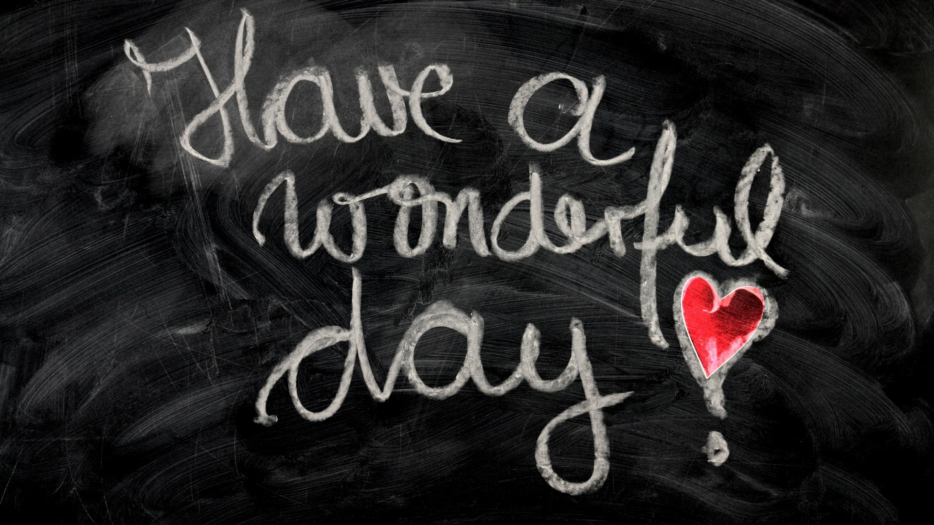 Chalkboard with the handwritten message Have a wonderful day and a red heart, presented as a 4K Ultra HD PC desktop wallpaper background.