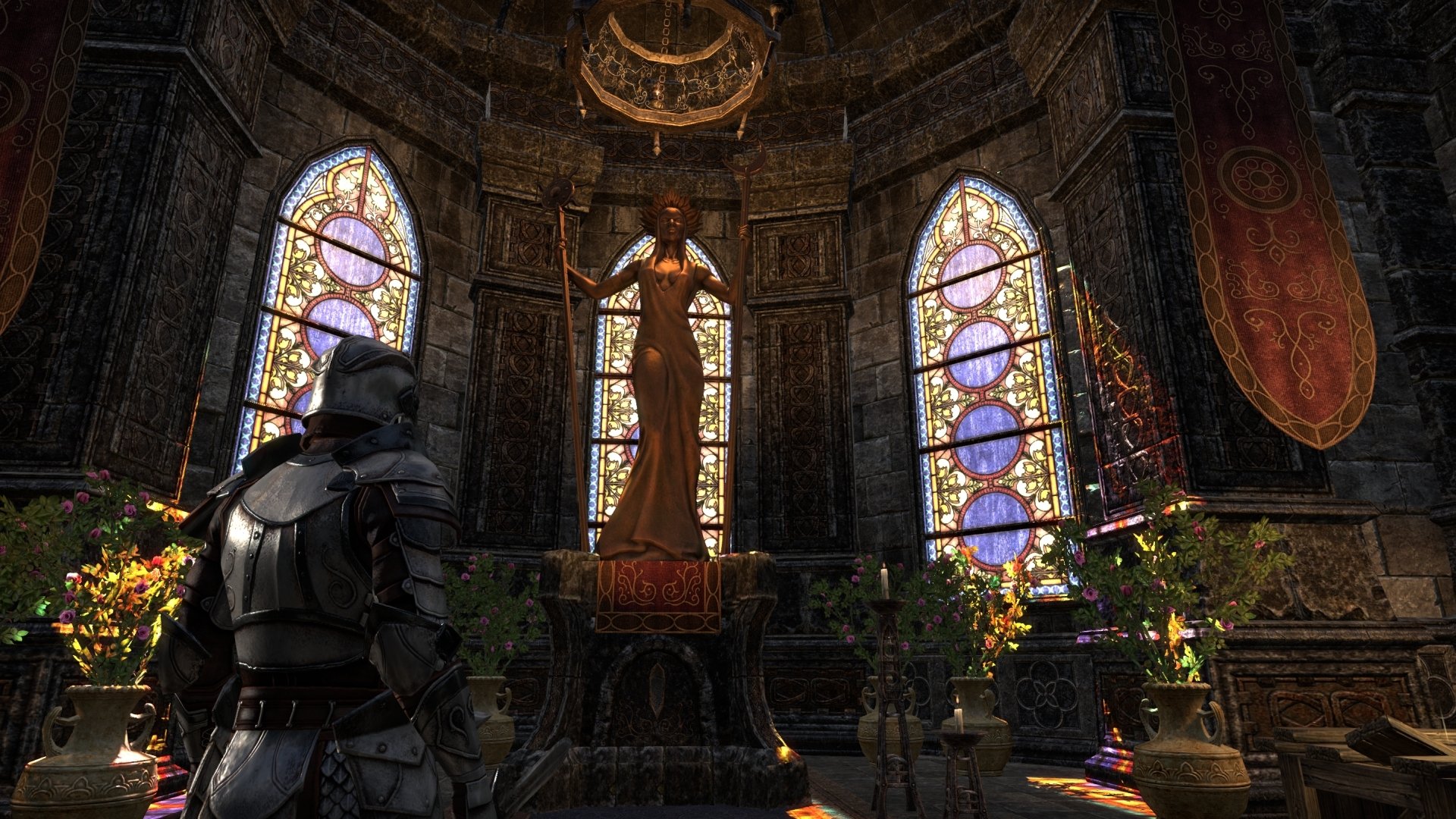 Knight in detailed armor stands inside a stained-glass-lit chapel, a statue before them in this HD PC desktop wallpaper from the video game The Elder Scrolls Online.