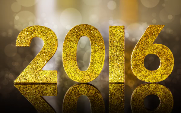 Golden glittering 2016 text with bokeh background, celebrating New Year 2016, presented as a 4K Ultra HD PC desktop wallpaper and background.