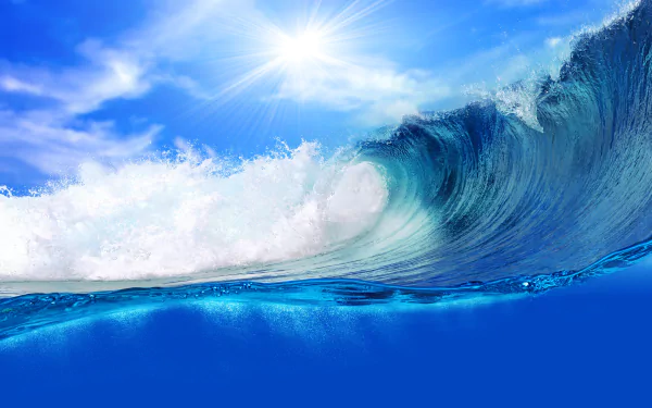 A vibrant 4K Ultra HD desktop wallpaper featuring a powerful blue ocean wave under a bright sun and clear sky.