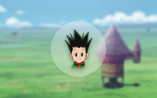 Gon Freecss from the anime Hunter x Hunter is featured as a prominent character in this HD desktop wallpaper, set against a vibrant landscape.
