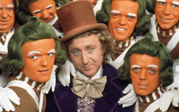 HD PC desktop wallpaper featuring Willy Wonka surrounded by Oompa Loompas from the movie Willy Wonka & the Chocolate Factory.