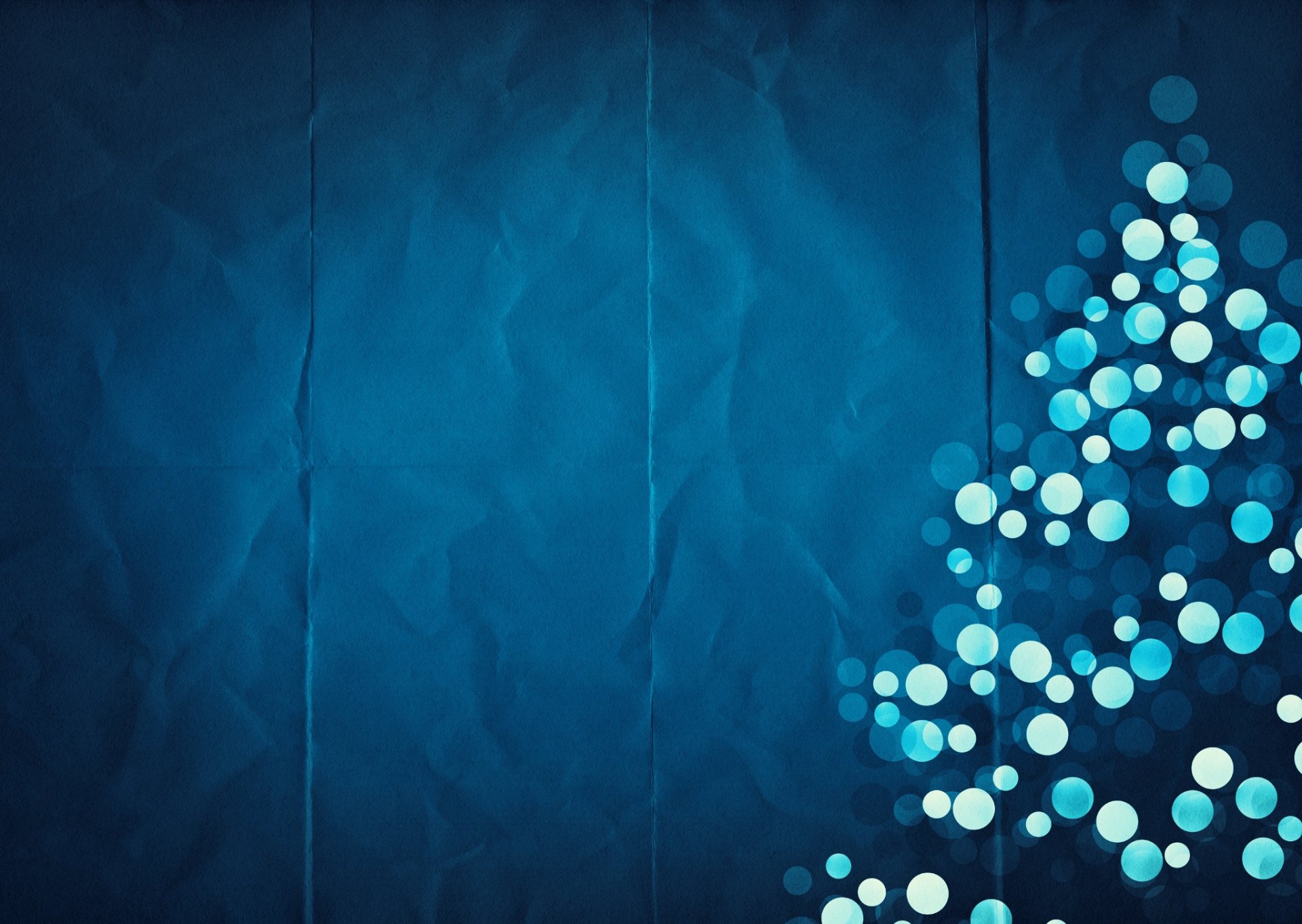 Minimalist blue Christmas tree composed of glowing dots on a textured blue background, designed as an HD PC desktop holiday wallpaper.