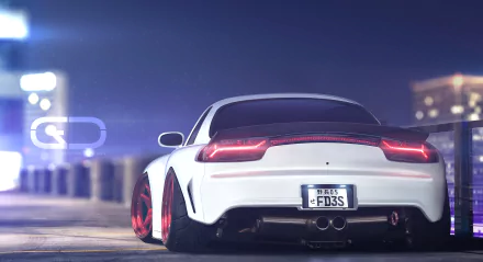 HD desktop wallpaper featuring the rear view of a white Mazda RX-7, showcasing the car's sleek design against a city night background. The license plate reads FD3S.