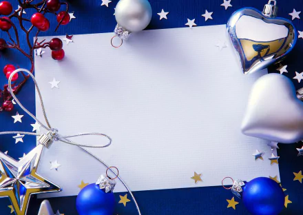 HD PC desktop wallpaper featuring festive Christmas ornaments, including silver hearts, a star, and blue baubles, arranged around a blank white card with scattered stars.
