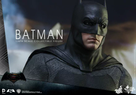 A high-definition desktop wallpaper featuring a detailed collectible figure of Batman from the movie Batman V Superman: Dawn Of Justice.