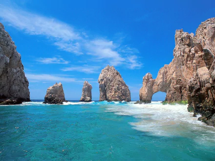 HD desktop wallpaper of the iconic rock arch formation and turquoise ocean waters at Cabo San Lucas, Mexico, showcasing stunning natural sea and coastal scenery.