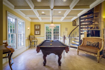 HD wallpaper of a bright interior lounge featuring a pool table, large windows, spiral staircase, elegant seating, and classic architectural details in a stylish room.
