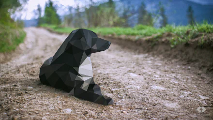 Abstract facets form the shape of a black dog resting on a dirt path in this HD PC desktop wallpaper and background.