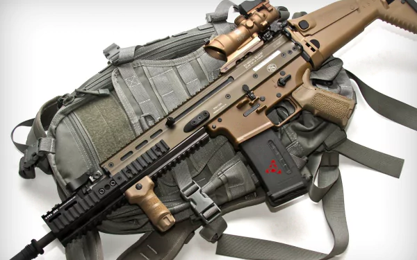HD PC desktop wallpaper featuring a detailed FN SCAR rifle resting on tactical gear, showcasing the man-made firearm's design and textures.