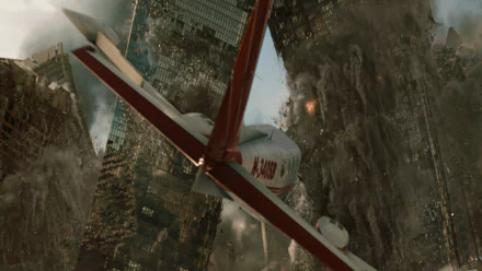HD PC desktop wallpaper from the 2012 movie showing a plane flying near collapsing skyscrapers amid a chaotic urban disaster scene.