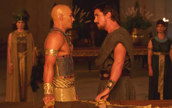 HD PC desktop wallpaper from the movie Exodus: Gods and Kings, featuring a tense confrontation between two central characters in ancient attire.