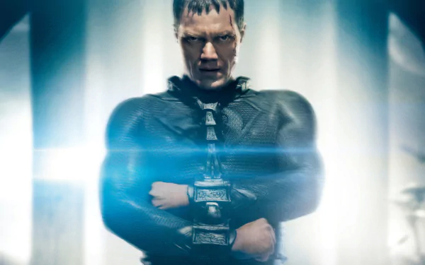 HD PC desktop wallpaper featuring a dramatic scene from the movie Man of Steel with a focused character in a dark costume and glowing blue light effects.