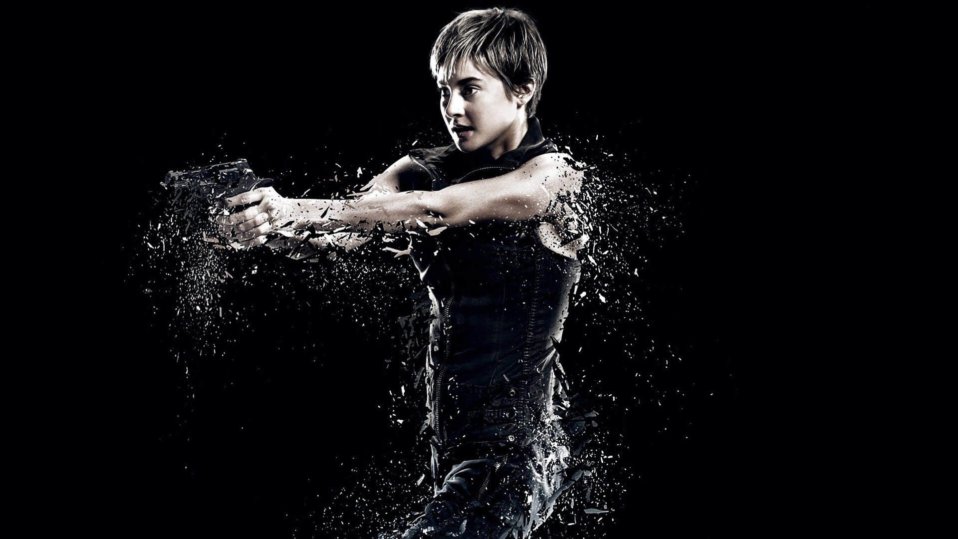 HD PC desktop wallpaper: a character from the movie Insurgent aims a handgun as water splashes around them against a stark black background.